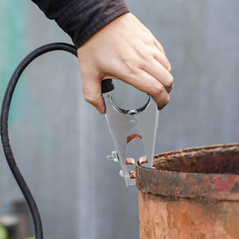 Heavy Duty Welding Ground Clamp With Iron And Copper Construction For Welders offering firm grip on a metal surface.