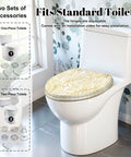 Elongated Vintage luxury seamless floral golden monstera leaves Toilet Seat on standard toilet for easy installation.