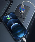 Six Port Usb C Car Charger With Led Voltage Display PD QC3 Fast Charging plugged into car charger, charging phone on console.