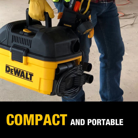 Man carrying a yellow Beast 4 Gallon Wet Dry Shop Vacuum With 5 Peak HP Corded Power for easy portability.