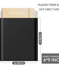Black 100 Pack Padded Bubble Mailers 6x10 Inches Self Seal Envelopes shown with a notebook to display size and dimensions.