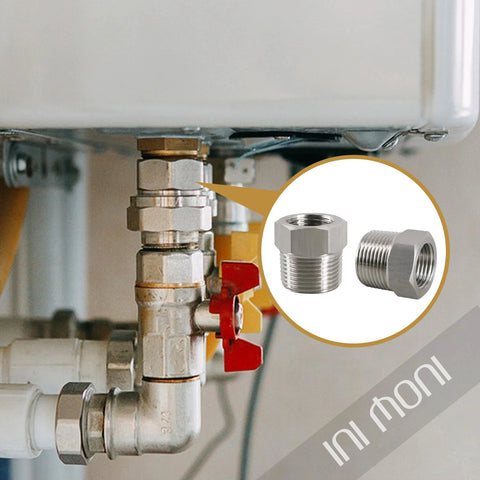 Close-up of stainless steel reducer hex bushing, 1/2 in male to 3/8 in female NPT, high-pressure pipe adapter