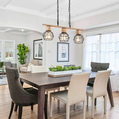 Farmhouse Three Light Bamboo Cage Pendant Light With Hemp Rope Accent Black Finish in dining room over table