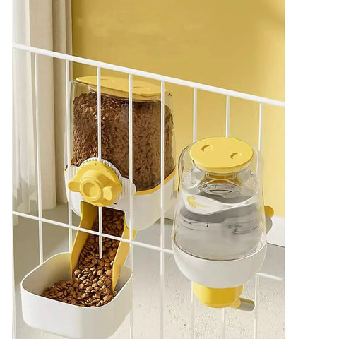 Hanging Gravity Pet Feeder Auto Water Dispenser No Drip Drinking Bowl Cage Mounted Food Dish For Dogs Cats Rabbits Heavy Duty Pp Plastic 37 Oz And 33 Oz Capacity Green Paw Friendly Chow Station in yellow on a wire cage.