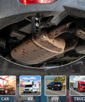 Covzoe exhaust hanger removal pliers, black metal tool installed under car near the muffler tailpipe