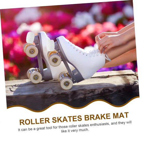 Person tying laces on white quad skates with 2 Pack Braking Block Roller Skate Toe Stops For Quad And Inline Skates attached