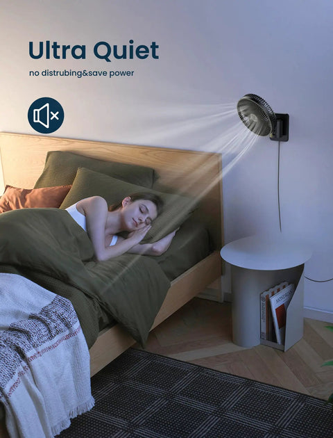 8.5 Inch Wall Mounted Oscillating Fan With Remote And Timer Ultra Quiet 4 Speed Options installed above a sleeping person in a bedroom
