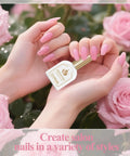 Hands holding Hema Free Gel Nail Polish in light pink with flowers background, showcasing manicure result.