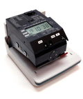 Zero Drama Digital Time Clock And Date Stamp Bundle Includes 100 Time Cards And Heavy Duty Rack, electronic time clock on white base.