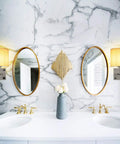Bathroom with marble walls, two mirrors, and Bedside Wall Sconce With USB Port And AC Outlet, White Fabric Shade