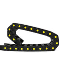 R55 Nylon Drag Chain Cable Carrier 0.98 x 3.03 in 25 x 77 mm, 1 Meter Length in black with yellow connectors, side view.