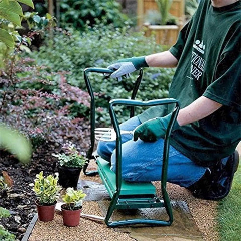 Heavy Duty Folding Garden Kneeler And Seat With Soft EVA Kneeling Pad Converts To Stool Or Bench, gardener using it among plants