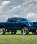 Blue truck with 27MHz CB Radio Antenna With PL259 And BNC Male Connectors, Magnetic Base Mount for mobile use in grass field