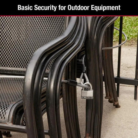 Beefy 15 Foot Looped End Steel Cable For Bikes And Outdoor Gear securing metal chairs with a padlock, outdoor setting.