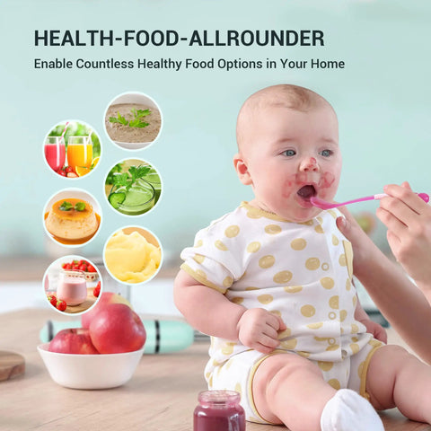 Baby being fed with spoon next to healthy food bowls and apples on a table, highlighting nutritious options for infants.