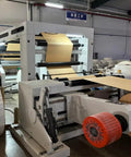 Industrial Smooth Operation Heavy Duty Automatic Jumbo Roll Slitter Machine Featuring Differential Slip Shaft For Insulation Paper Sheets and Job Ready Site Setup in production view.