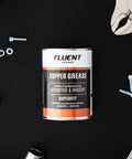 Copper Based Anti Seize Lubricant 11 Oz For High Temperature Fasteners Up To 1202 F surrounded by tools on black background