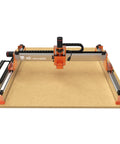 Big Benchtop CNC Router With 33x33 Inch Work Area And Four Point Seven Two Inch Pass Height NEMA 23 Closed Loop Steppers 16mm XY Ball Screws 12mm Z Screw Beefy Rigidity For Wood Aluminum Acrylic Carbon Fiber DIY Cutting in front view on a workbench.