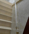 Clear Acrylic Stair Rail With Elegant Gold Brackets Adjustable Handrail Kit For Indoor Outdoor Rooms Slick Look Top Shelf Home Flex Easy Install Four Point Five Feet installed on wooden steps.