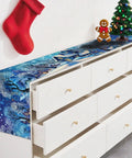 Cozy Linen Christmas Table Runner With Blue Snowy Village Winter Scene For The Fam And Family Holiday Gatherings 13x72 Inches 2D Printed Tabletop Decor That Brings Festive Winter Vibes on a dresser
