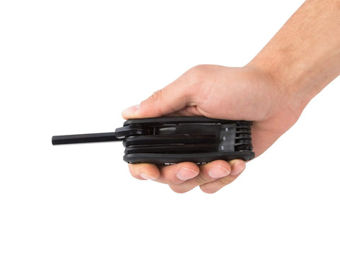 Hand holding Pocket Folding Hex Key Wrench Set With 1.5 2 2.5 3 4 5 6 8mm Sizes, Chamfered Ends, Steel With Black Oxide Coating