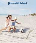 Kids playing soccer with Portable Backyard Soccer Goal 6x4 Ft With Net And Ground Stakes, Heavy Duty Steel Frame For Adults And Youth Practice, Training Drills, Easy Setup, Perfect For Backyard Games And Competitive Sessions on beach