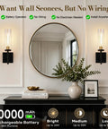Plug And Play Wireless Wall Sconces With Smart Remote Control And Massive 10000Mah Battery Dimmable Rechargeable Lighting Set Of Two sleek black fixtures mounted beside a round mirror.