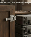Stainless Steel Spring Latch With Spring-Loaded Closure on wood cabinet, keeping toolboxes secure through vibration and travel.