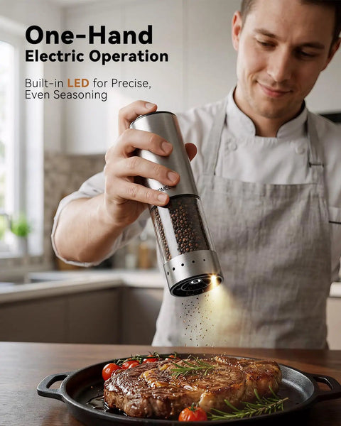 Person using Rechargeable Electric Salt And Pepper Grinder Set With LED Display seasoning steak on kitchen worktop.