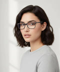 Woman wearing Arctic Blue Light Blocking Reading Glasses 1.5 Diopters For Computer And Gaming Eyewear Anti Glare Clear Lenses