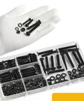 Gloved hand holding components from 231 Pieces Machine Screws And Nuts Kit M4 M5 M6 Phillips Flat Round Head 304 Stainless Steel Nuts Bolts Washers Set Black For DIY Wall Plate Switches And Furniture Assembly over open kit box.