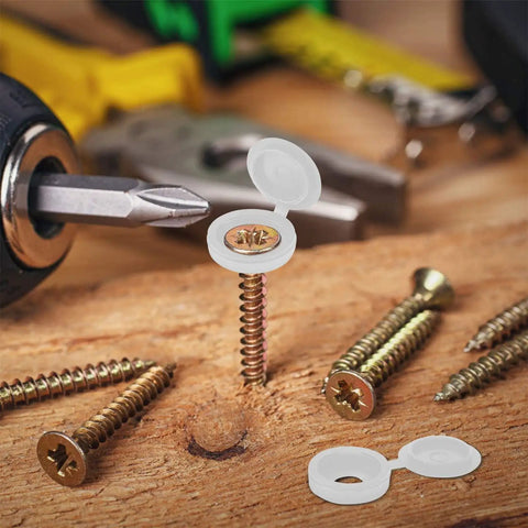 100 Pack Slick Hinged Screw Cap Covers Small White Plastic Dust Shield Plugs installed on a screw with tools in background.