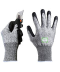 Three Pair Level Five Cut Resistant Gloves With Nitrile Coated Grip shown holding a utility knife, showcasing grip and durability.