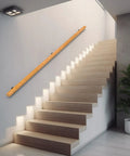 Tough As Nails 2 Feet Wooden Stair Handrail Wall Mount on modern staircase, smooth pine material enhancing safety, indoor use.