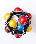 Top view of Nespresso Vertuo Pod Holder Carousel Stand 360 Degree Spinning Coffee Capsule Organizer displaying colorful pods.