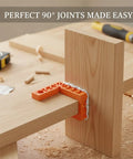 Dead Straight 90 Degree Woodworking Jig For Square Corner Assembly positioning two wooden boards with thick orange plastic.