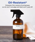 Slick Waterproof Wraparound Rectangle Labels Matte White 1-1/4 X 9-3/4 Inches on amber spray bottle with black sprayer.