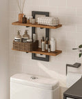 Heavy Duty Floating Wall Shelves 15 Inch 2 Tier Set 2 Rustic Brown Black mounted in bathroom with bottles and decor.