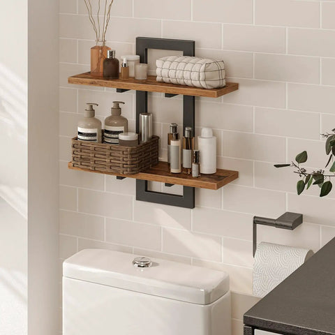 Heavy Duty Floating Wall Shelves 15 Inch 2 Tier Set 2 Rustic Brown Black mounted in bathroom with bottles and decor.