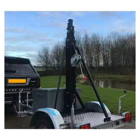 Heavy Duty Eight Meter Telescopic Mast Badass Rig with Knuckle Saver mounted on trailer for camera gear lifting.