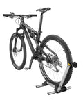 Mountain bike on LineUp Portable Folding Bike Stand For 20 To 29 Inch Wheels, Lightweight Aluminum, Quick Setup