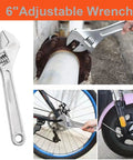 Compact Motorcycle Repair Tool Kit For Harley Davidson Riders with 6 inch adjustable wrench shown in use on a pipe and bike tires