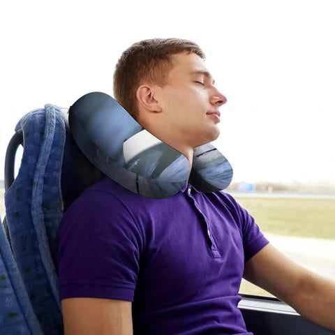 Man resting on bus with Ultra Comfy U Shaped Travel Neck Pillow For Flights And Long Hauls, Ergonomic Memory Foam Neck Support With Anti Slip Design
