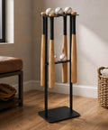 Heavy Duty Baseball Bat Stand With Badass Iron Frame Hella Tough Sports Equipment Rack for displaying four bats and five balls.