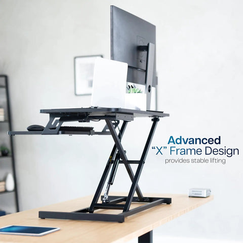 Height Adjustable 32 Inch Desk Converter With Sit To Stand Quick Elevation Tabletop Dual Monitor Riser For Home Office Ergonomic Workstation Black Go To Setup For Small Home Offices, black frame with raised platform holding a laptop and monitor.