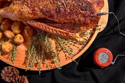 Turkey on wooden platter with DOT Alarm Thermometer For Chefs One Touch Temperature Target Quick Reliable Kitchen Probe, Cayenne Pepper Red.
