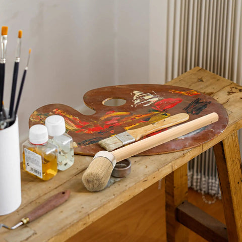 Wood Stain And Paint Brush With Wooden Handle 50Mm Round Head For Trim, Furniture And Wall Finishes on artist's palette