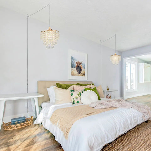 Straight Up Gold Plug In Pendant Light With 16 Foot Long Cord And Sparkling Three Tier Crystals For Kitchen Island Or Cozy Bedroom Setup Premium Slick Mini Chandelier Drip hanging above a cozy bed in a well-lit bedroom.