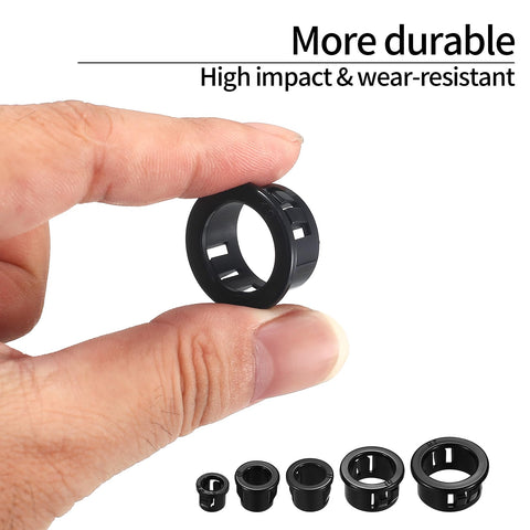 Person holding a bushing from 305 Piece Black Nylon Cable Snap Grommets Set Round Locking Bushing Protectors For Wires Includes Five Sixteenths Three Eighths One Half Inch Five Eighths Three Quarters Inch.
