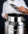 Chef opening Top Shelf 304 Stainless Steel Food Storage Container for coffee, rice, flour, and dry goods in kitchen.